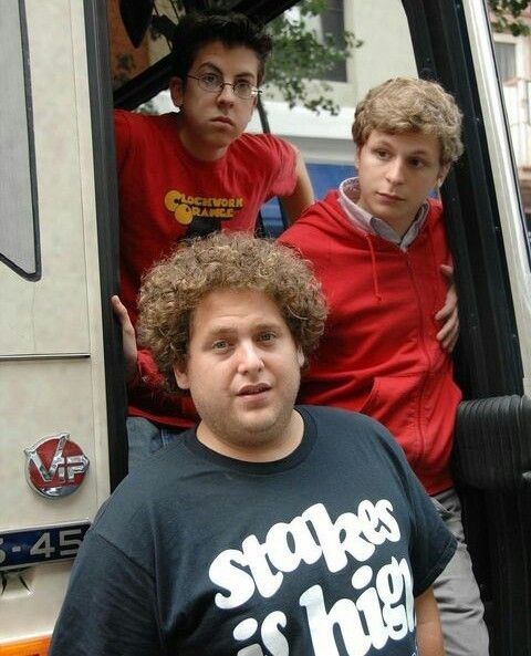 An image showing the three main characters from the movie Superbad getting off of a bus. Jonah Hill is in front, Michael Cera behind him and Christopher Mintz-Plasse is at the end.