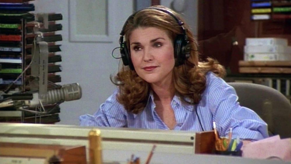 Still from the television show Fraiser showing Roz at the KACL control board
