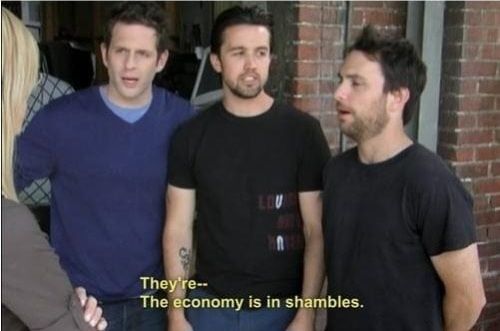 The second shows a reverse angle with Mac Charlie and Dennis responding to Dee who is mostly off camera. Text reads 
"They're--
The economy is in shambles."