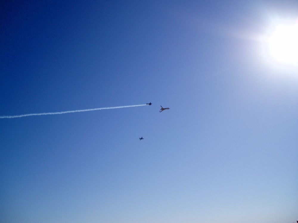 Beech Starship in flight with Extra 300 with smoke on and Alpha Jet

all chase aircraft for Spaceship One first private space flight