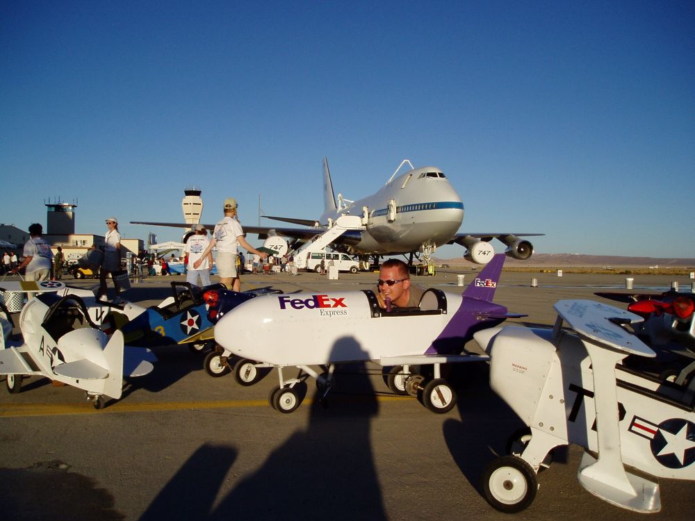 Sitting in a FedEx toy plane at Edward’s fab with the NASA SCA in the background 
