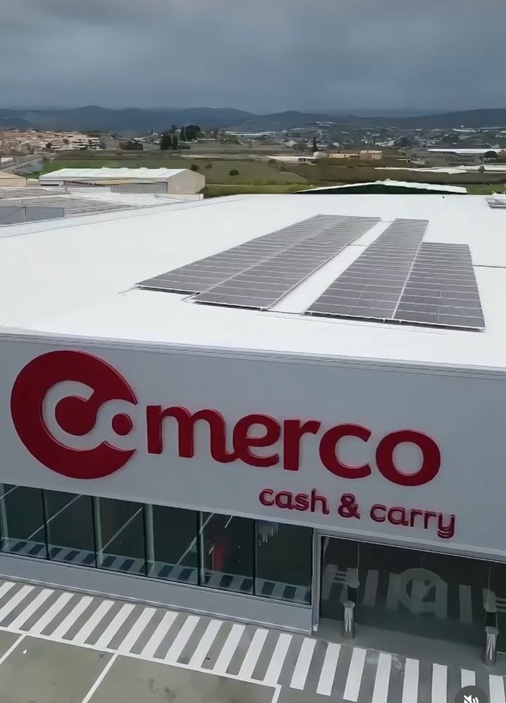 The entrance of a Comerco cash and carry as shot from above.