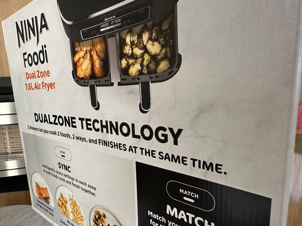 An unopened air fryer. On the box it proudly boasts ‘finishes at the same time’ which, let’s face it, is the dream right there