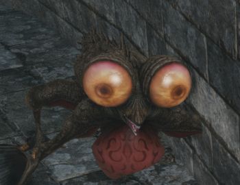 A Basilisk from Dark Souls.
It has very funny bulbous head ornaments that look like eyes (but they're not)