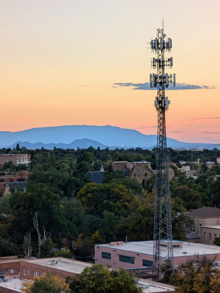 Santa Fe and distant mountains in fading light