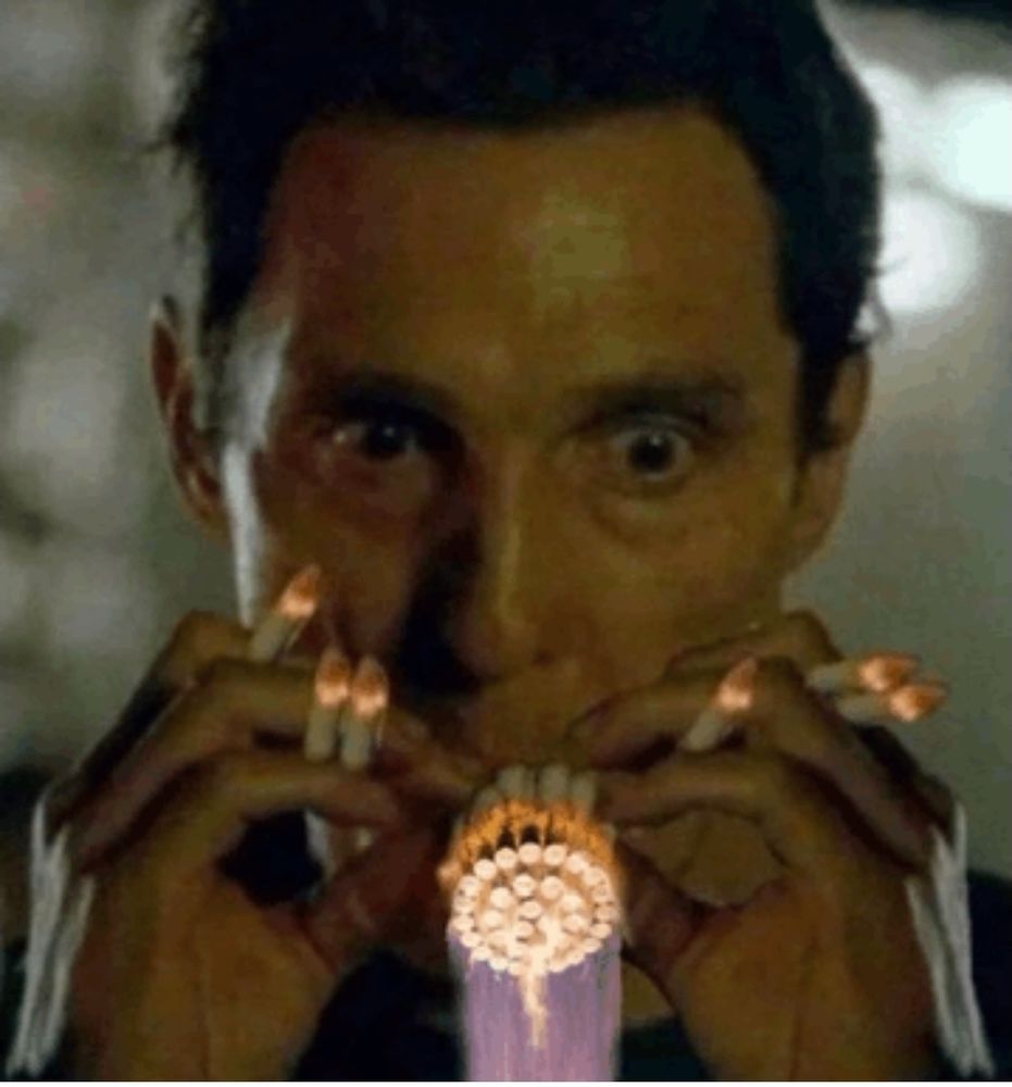 Photo of Matthew Mcconaughey stress smoking a large amount of cigarettes 