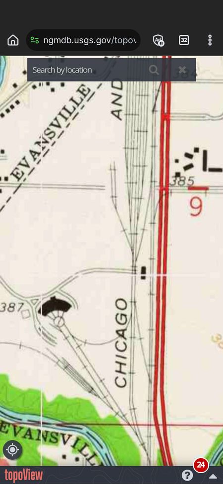 An actual map of the sad aerial photo I posted a few days back, showing the "new" C&EI yards, north of Evansville. Pigeon Creek, in blue, is in the lower left corner, surrounded by the green area of trees and native plants. The red lines running top-to-bottom, on the right side, represent US 41. Rail lines, just to the left of the highway, also run parallel to it, expanding in to a large yard at the top. The area in the photo is shown in the lower half of the left side. A turntable, roundhouse, another small yard.