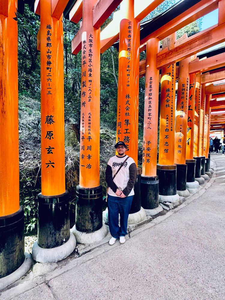 Me in front of the red tori gates.