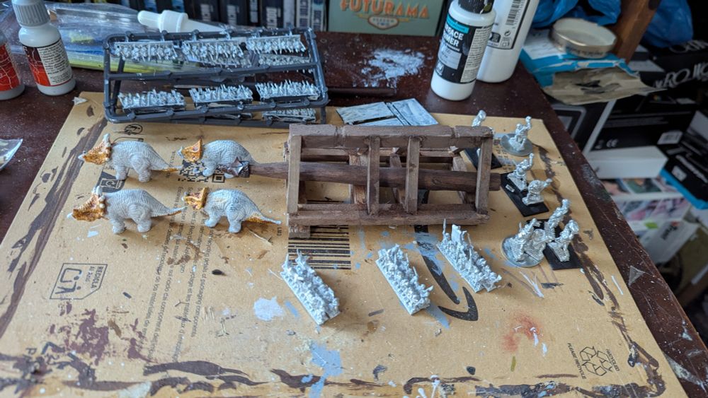 Framework of ram with primed goblins to the side, and based trolls behind, and beasts in front to haul the ram

Behind them frames of primed goblins