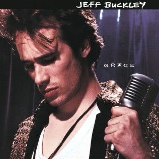 Cover of Jeff Buckley's album Grace. Features Buckley looking down while holding a microphone in his left hand. 