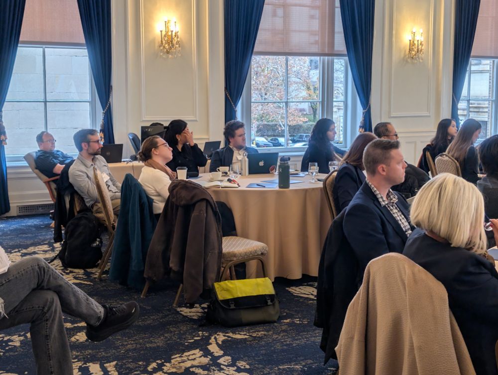 Retreat attendees listening to a lecture.