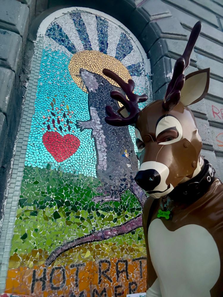 Rubber deer in front of the Hot Rat Summer tile mosaic in Cal Anderson Park