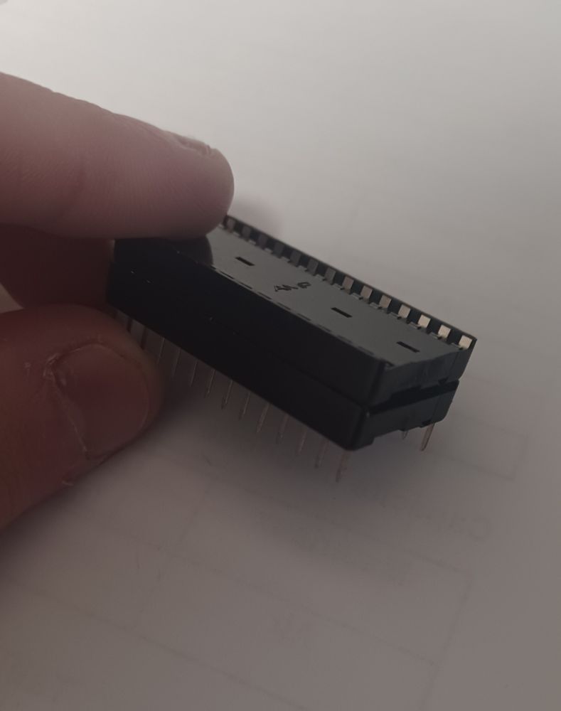 two DIP-28 chip sockets inserted one into another