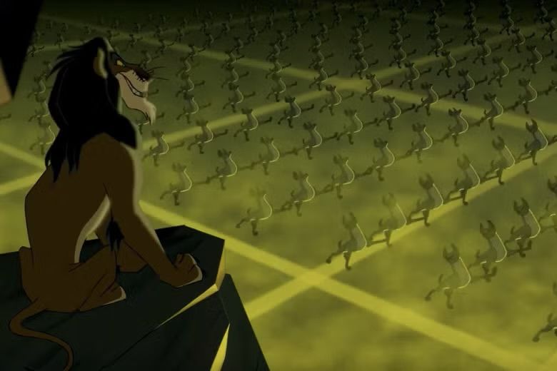 Screenshot of hyenas marching during the “be prepared” scene in the animated version of The Lion King