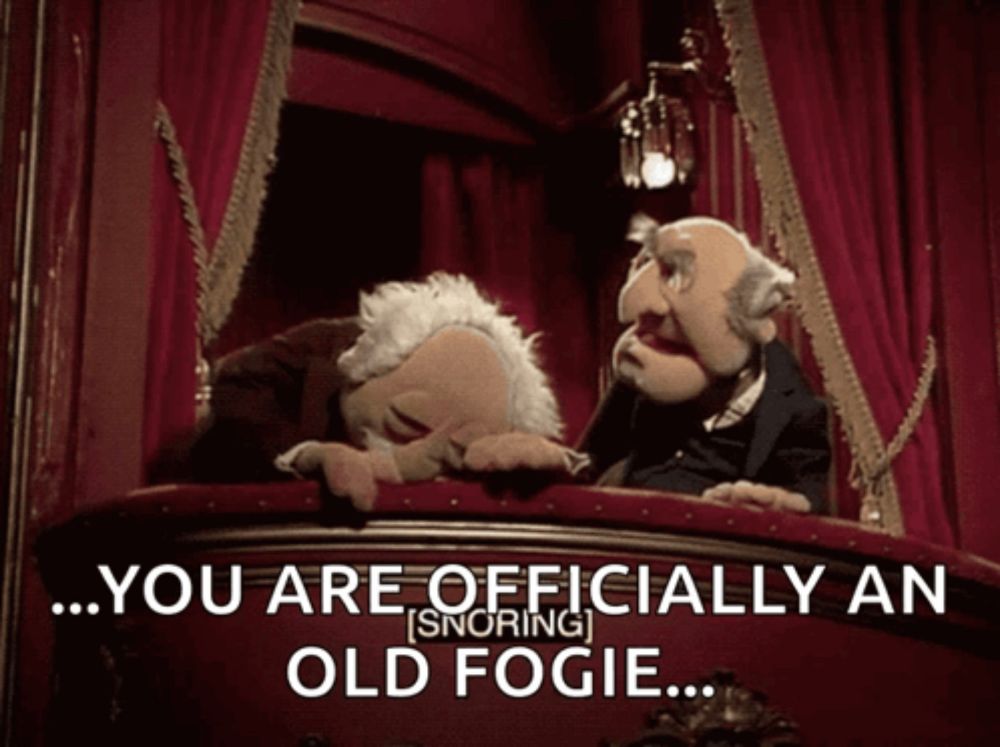 two muppets on a balcony with the words " you are officially an old fogie " above them