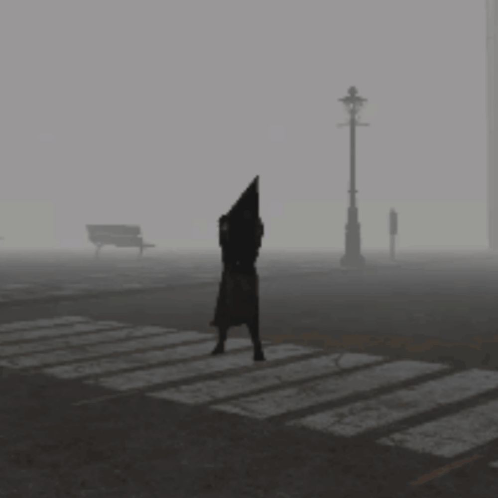 a person with a pyramid head crossing a street