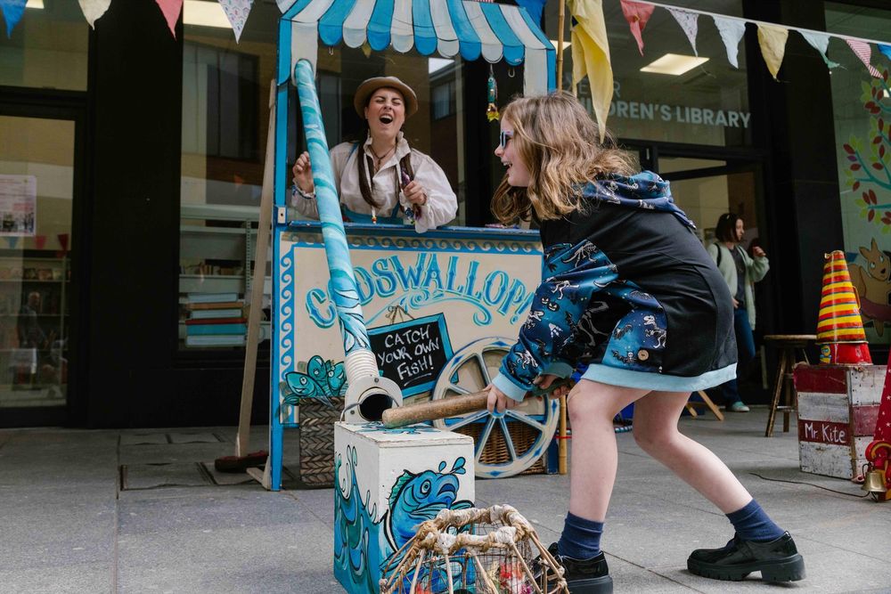 Children playing seaside games.