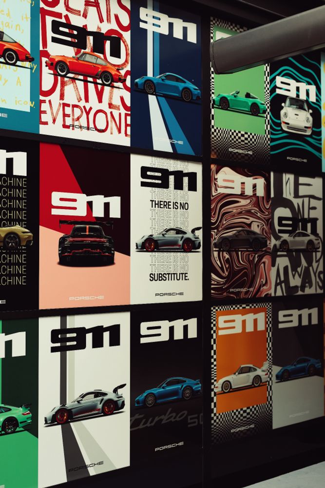 A selection of posters depicting the Porsche 911