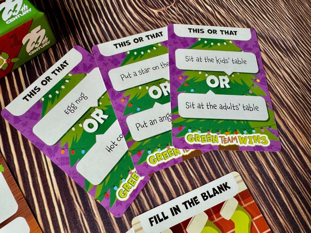 The This or That cards from Green Team Wins. One says Sit at the kids' table OR sit at the adults' table. I'd say adults' because at a certain point, I feel like I've earned it. 