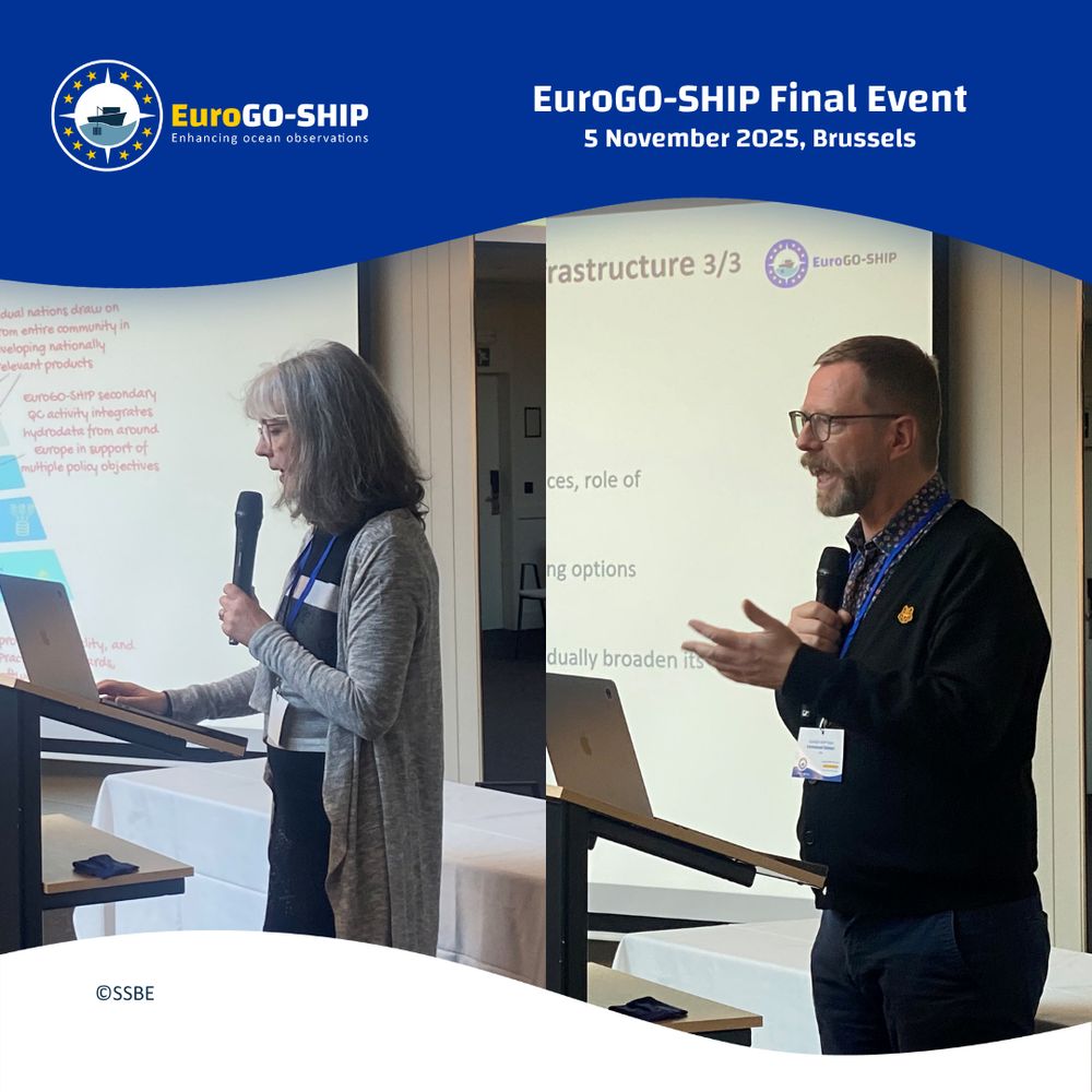 A woman and a man presenting in front of presentation slides