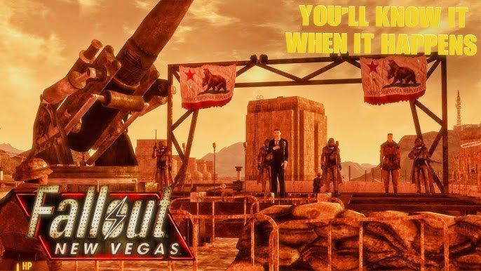A screenshot from the video game Fallout New Vegas. The bottom left displays the name of the game. The top right has the name of the in game mission: "You'll know when it happens".

The Image itself depicts New California President Aaron Kimball giving a speech on a makeshift stage erected on the heavily fortified Hoover Dam.
