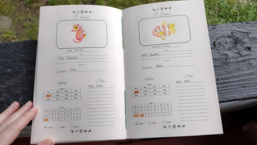Two journal pages, starting to be filled out. The left page is for the sea horse, the right is for the clownfish. Both have drawings. Both have details starting to be entered.