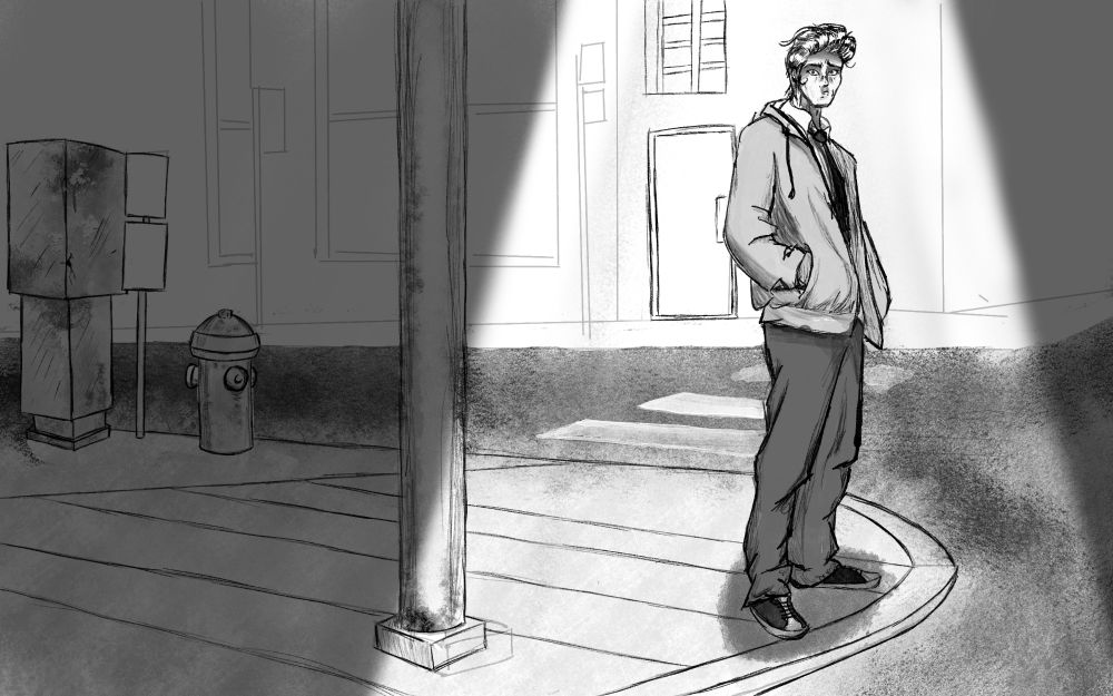 Man in baggy business attire on a street corner at night under the beam of a street light. He is staring towards the viewer with a confused look on his face