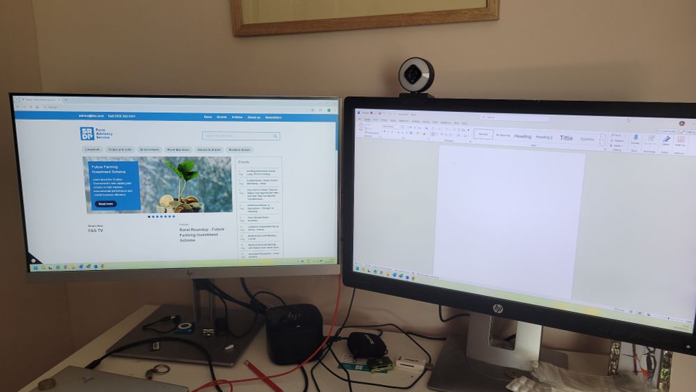 Two computer monitors working during g a power cut