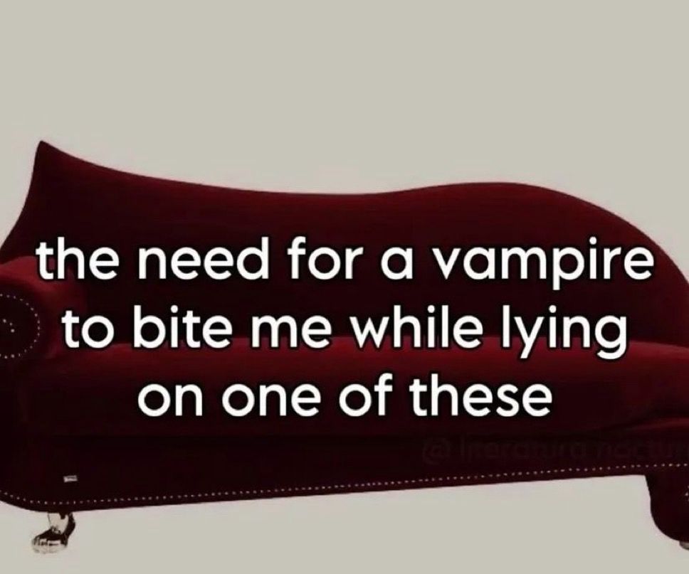 a long red fainting couch 
text: the need for a vampire to bite me while lying on one of these 