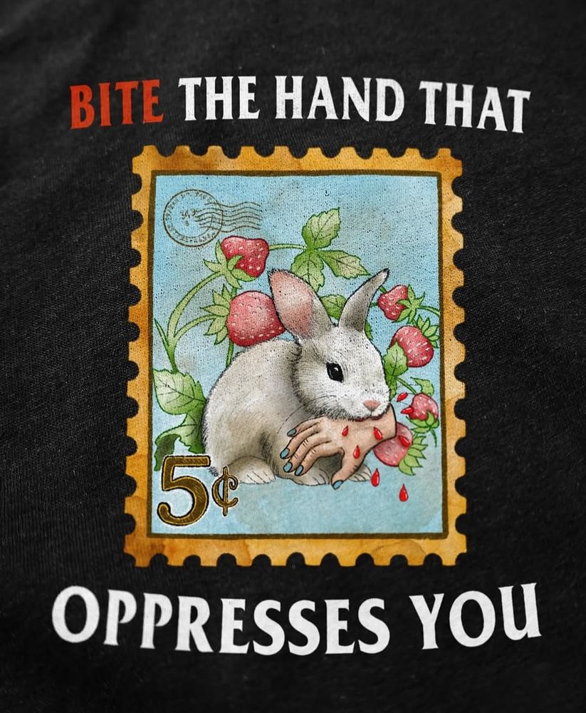“bite the hand that oppressed you” ft bunny on a stamp chomping a hand