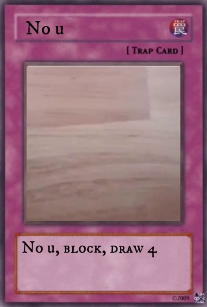 a card that says no u on it and says no u block draw 4