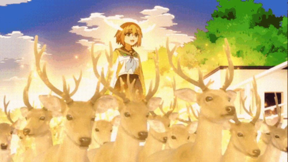 a girl is surrounded by a herd of deer