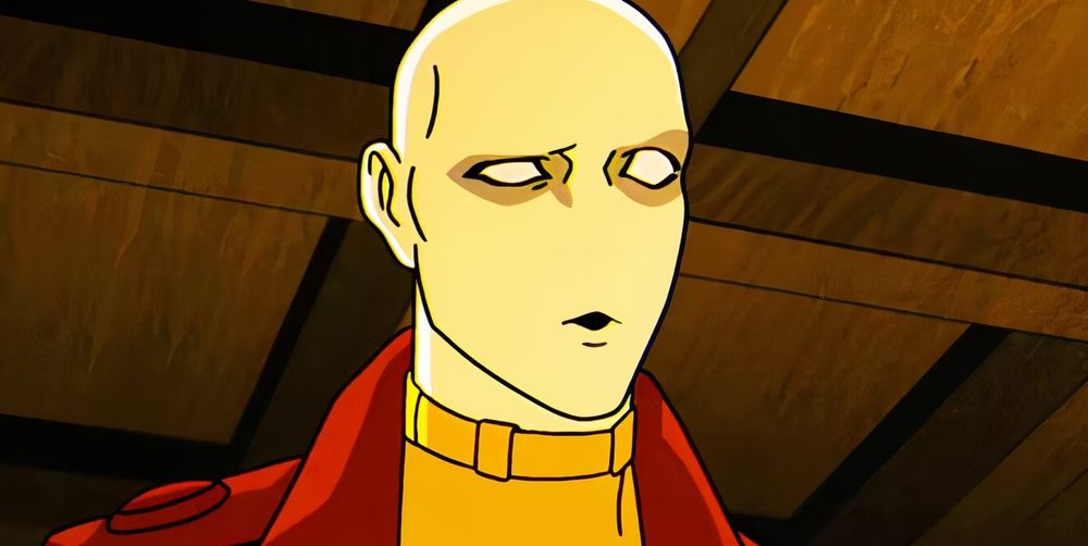 A close-up shot of a confused Morph from X-Men '97; his bald, nose-less face looking as lost as his missing pupils. Just visible: His cool brown jacket that he wears over his 'lil yellow X-Men onesie.