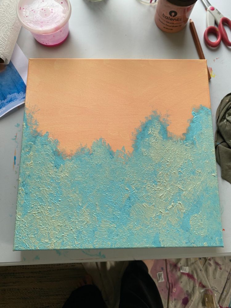 Abstract acrylic on Canvas piece of peach in the back top.  Blue creeping up into the the peach