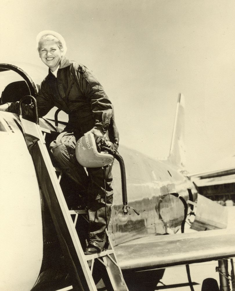 Jackie Cochran climb into the cockpit of her plane. Photo credit: FAI record file archives.
