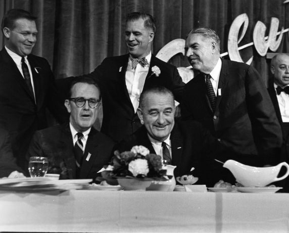 President Lyndon Johnson meets with Michigan political leaders at Cobo Hall in Detroit in 1964. He is joined by former Gov. John Swainson, U.S. Sen. Phil Hart, former Gov. G. Mennen “Soapy” Williams and U.S. Rep. Neil Staebler (D-at large). Photo credit: Walter P. Reuther Library, Archives of Labor and Urban Affairs, Wayne State University, Tony Spina Collection.