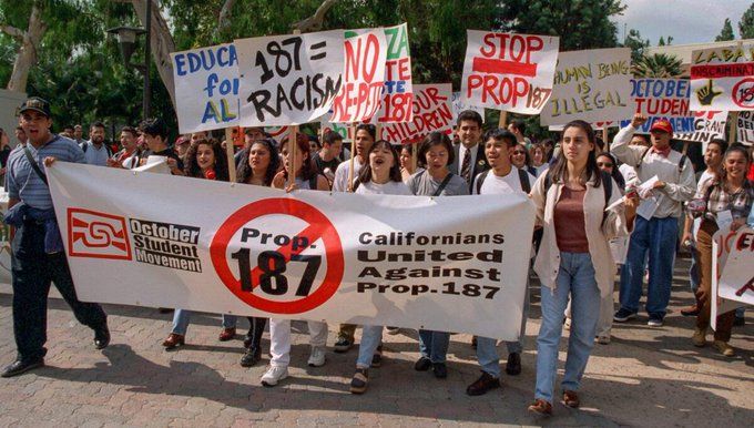Activists protest Prop 187 in California. Photo credit: Paul Morse / Los Angeles Times.