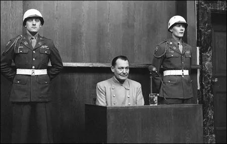 Herman Goering, Hitler’s right-hand man and chief architect of the German war effort, testifies at his trial. He was found guilty of war crimes but avoided execution by swallowing potassium cyanide. Photo courtesy of Special Collections Department, Harvard Law School Library.