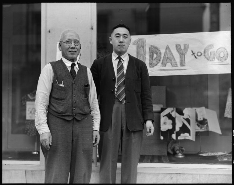 Dave Tatsuno and his father, merchants of Japanese ancestry in San Francisco prior to evacuation, April 4, 1942. Photo by Dorothea Lange, courtesy of the National Archives and Records Administration.
