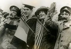 Allied soldiers, sailors and Red Cross workers celebrating the end of WWI, Nov. 11, 1918. Photo credit: Encyclopædia Britannica, Inc.