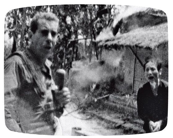 Frame from the video footage of Morley Safer reporting from the village of Cam Ne in Vietnam.