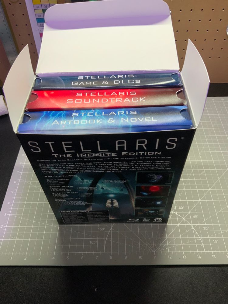 Inside the box. That has custom inserts Game, Soundtracks, Art and Novel books