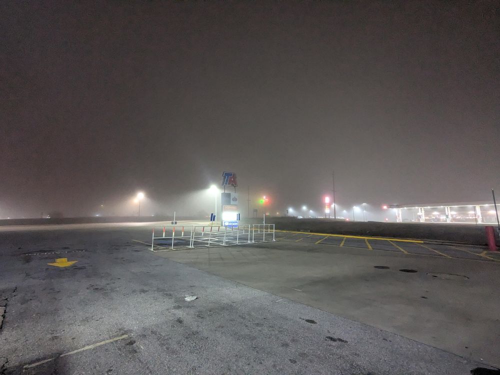 A foggy gas station 