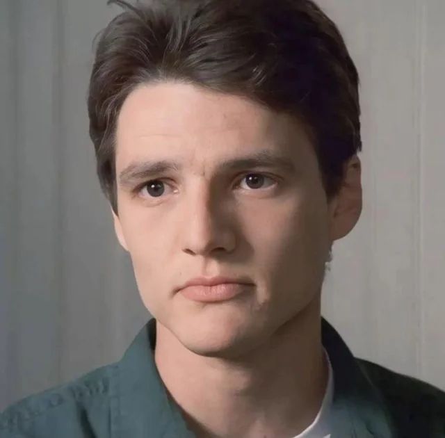 Young Pedro Pascal sporting a Season 1 Chandler Bing look complete with swoopy hair and a neutral, button-up shirt. I know I said, "Will Forte," and that's who his face resembles. But the look? That's Bing.