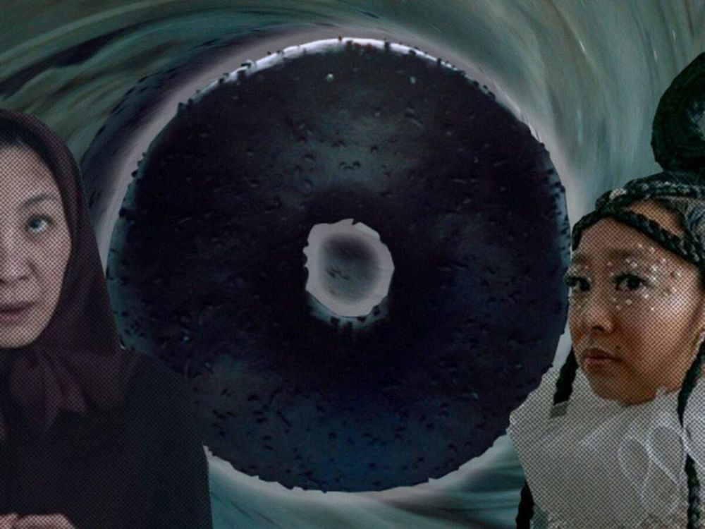 Michelle Yeoh, Stephanie Hsu, and a big, dark, shadowy everything bagel that looks like a void.