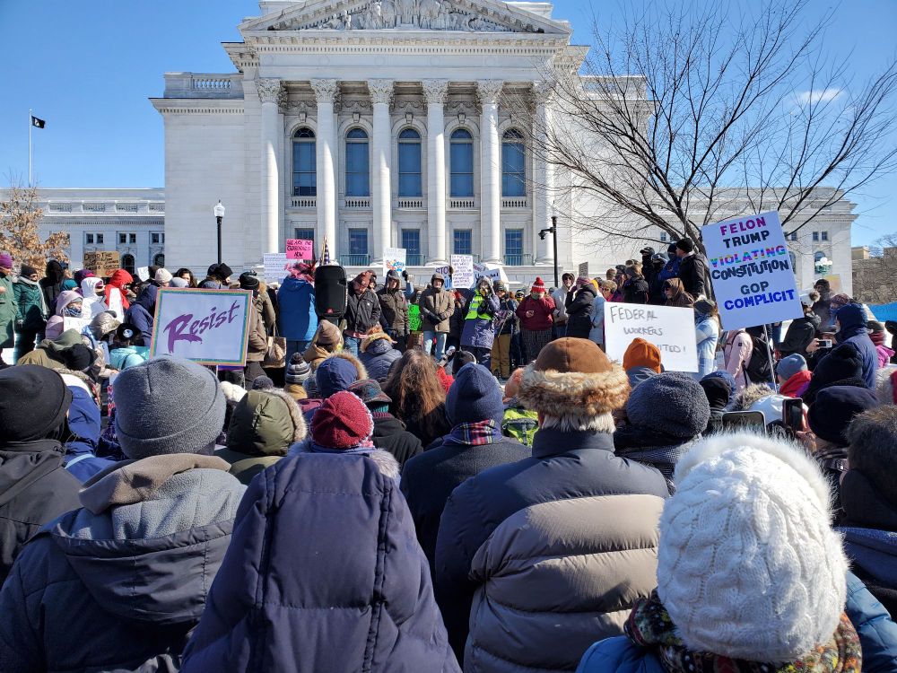 Hundreds of Wisconsinites standing in the cold, on the steps of the state capitol, protesting the illegal coup on Presidents Day.