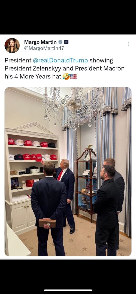 Macron and VZ being shown a tacky display of caps by Trump.
