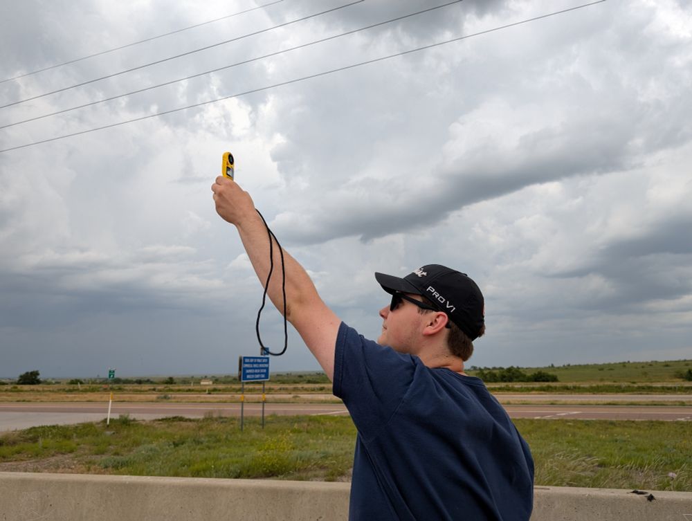 Danny measures outflow wind speeds using a handheld anemometer