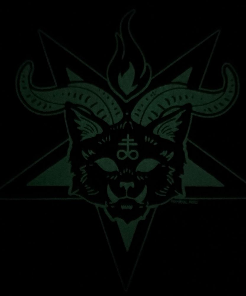 A devil cat print that glows in the dark 