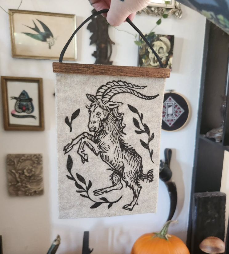 A banner with the dancing goat design 